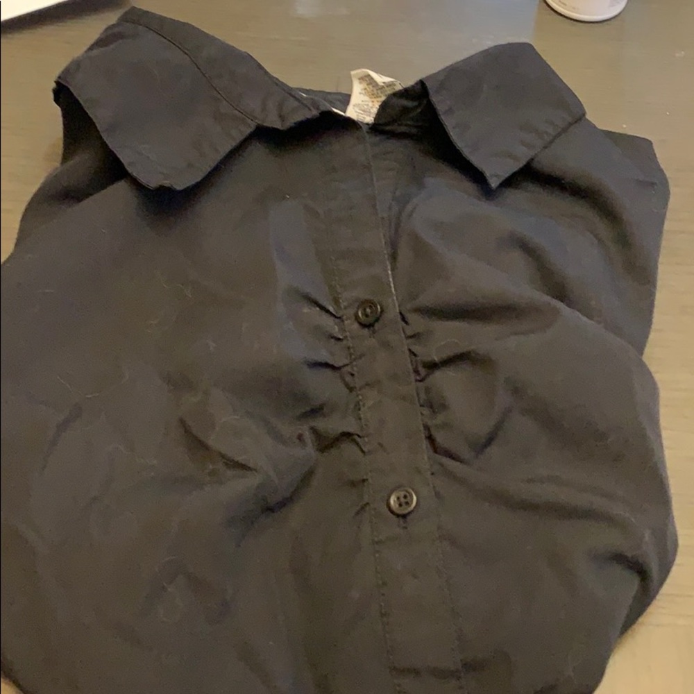 Sleeve less button up shirt
